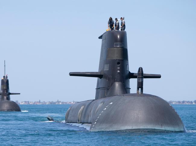 Collins Class Submarines, HMAS Collins, HMAS Farncomb, HMAS Dechaineux and HMAS Sheean in formation while transiting through Cockburn Sound, Western Australia. *** Local Caption *** Royal Australian Navy Collins Class Submarines HMAS Collins, HMAS Farncomb, HMAS Dechaineux and HMAS Sheean were joined in formation by United States Navy Submarine USS Santa Fe in the West Australian Exercise Area for a photo opportunity in February 2019. The submarines were in the area to participate in several activities, including Exercise Lungfish 2019 and Exercise Ocean Explorer 2019.