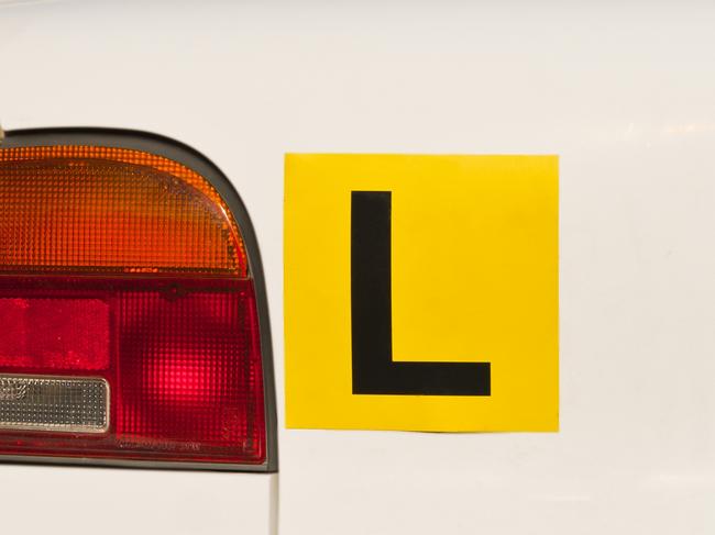 Image Of A Yellow L-Plate On White Car , Indicative Of A Learner Driver. Picture: iStock