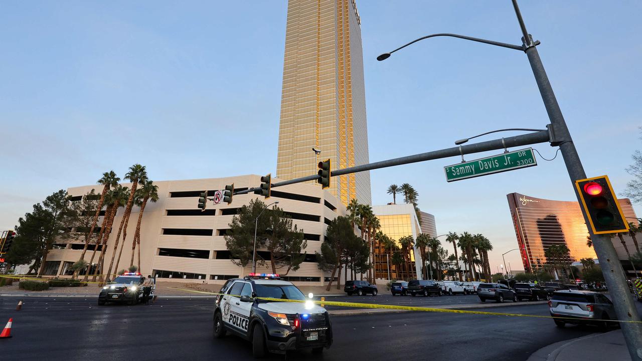 Las Vegas Metropolitan Police Department vehicles block the road near the Trump International Hotel &amp; Tower Las Vegas after a Tesla Cybertruck exploded in front of the entrance on New Year’s Day. Picture: Ethan Miller/Getty Images/AFP