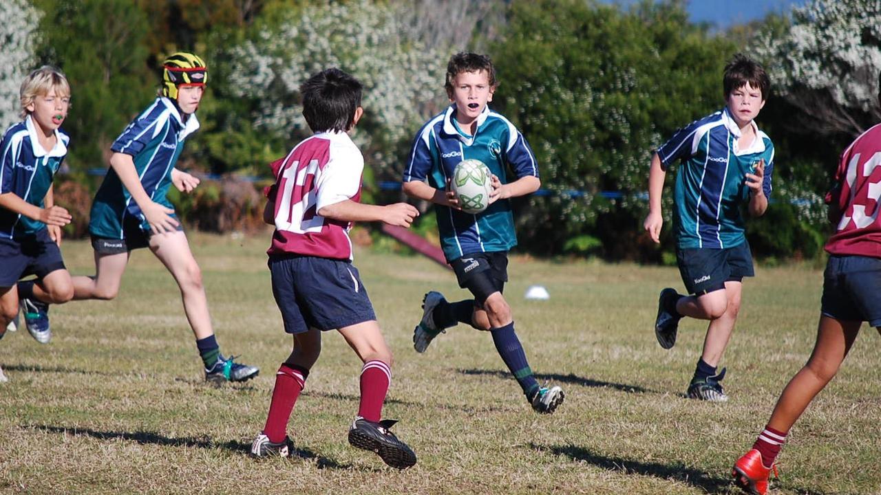 Garry Jones as a junior in action for the USC Barbarians. Picture: Contributed.