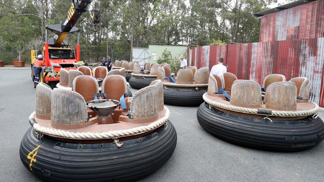 Carriages are removed from the scene at Dreamworld. Picture: Richard Gosling