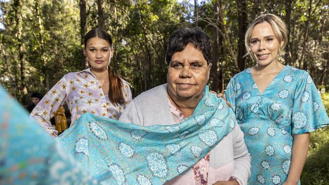 (L-r) Tearnee Lewington, Jean Barr Cronbie and Codie Barr wearing Red Ridge the Label. Jean Barr Cronbie (centre) is one of the number of Aboriginal artists involved with Red Ridge the Label. Picture: Matthew Poon