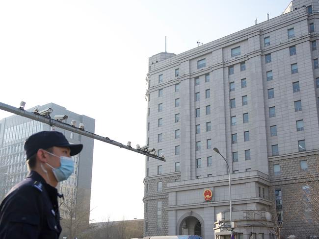 The wheels of ‘justice’ … a policeman outside Beijing No. 2 People's Intermediate Court, where Cheng Lei’s trial took place in March, 2022. It would be 17 months before she learned her sentence. It would have been five years, although government diplomacy meant she was released after three years and two months.