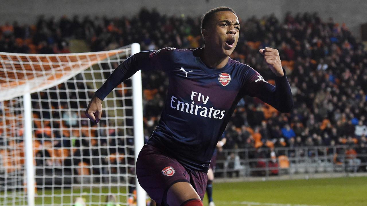 Joe Willock celebrates after becoming Arsenal's youngest FA Cup scorer.