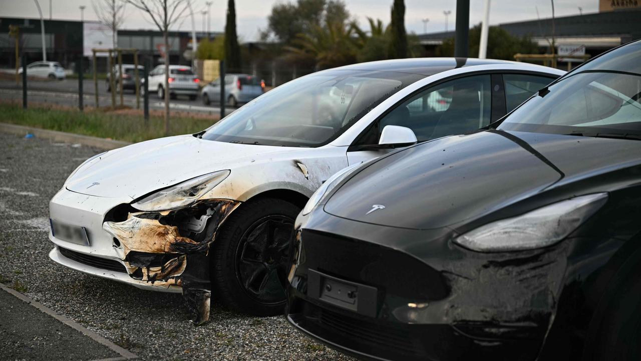 <!DOCTYPE html PUBLIC "-//W3C//DTD HTML 4.0 Transitional//EN" "http://www.w3.org/TR/REC-html40/loose.dtd"><html><body><p>12 Teslas were reportedly torched in the attack. Picture: Lionel Bonaventure/AFP</p></body></html>