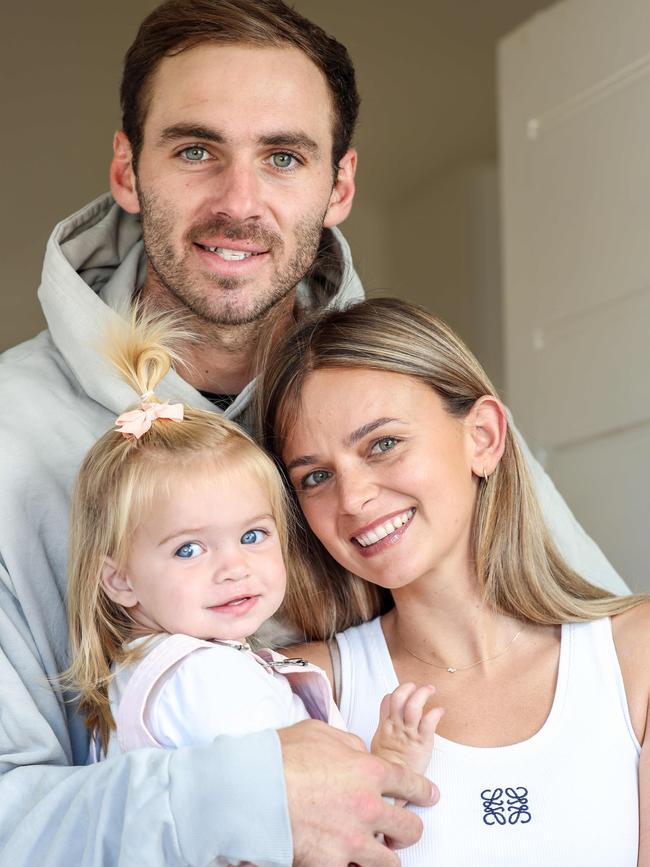 Kellie Finlayson with her husband Jeremy and daughter Sophia. Picture: Russell Millard