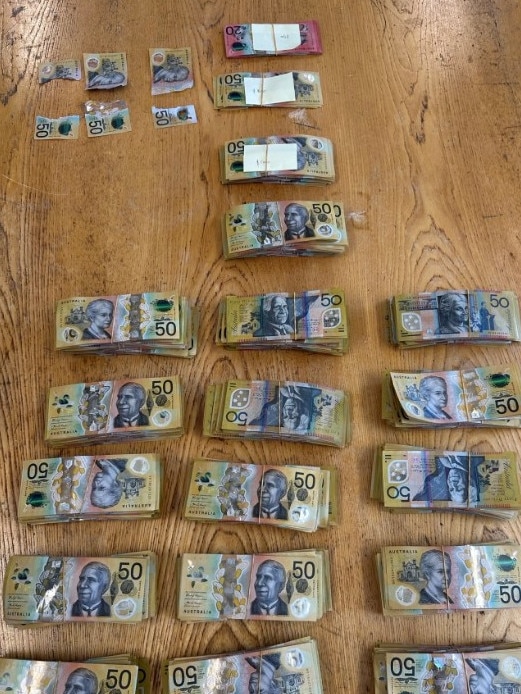 Money found inside the shopping bag that was buried in the scrub near Ceduna. Picture: SAPOL