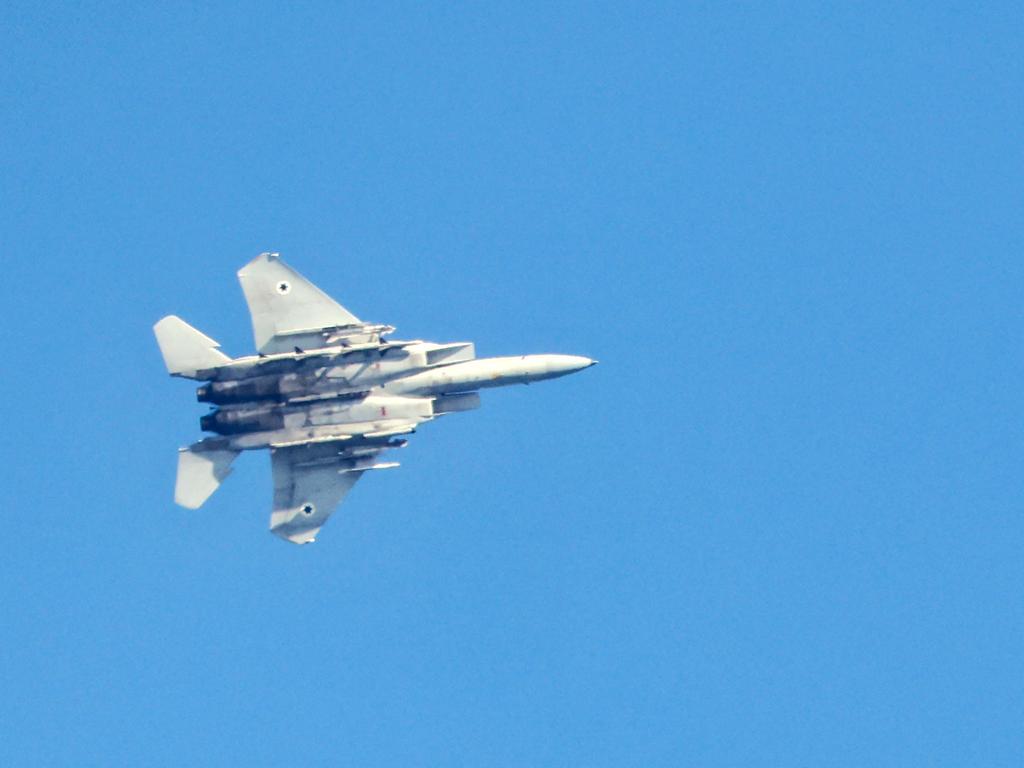 An Israeli F-15 Eagle fighter jets flies over the northern city of Haifa as tensions between Israel and Hezbollah escalate. Picture: AFP