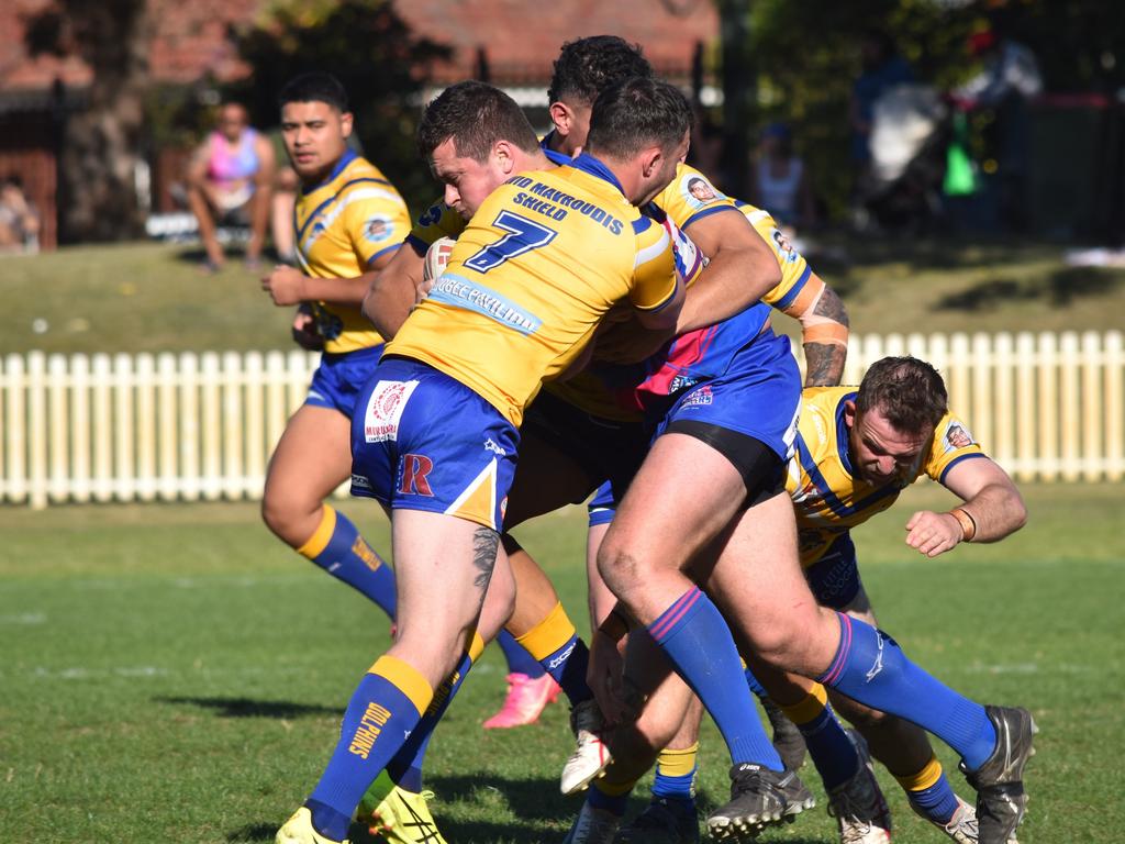 RIley Lord takes on the Dolphins defence. Picture: Sean Teuma