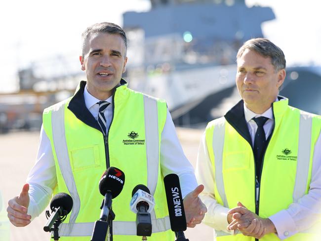 ADELAIDE, AUSTRALIA - NewsWire Photos July 6 2022: Deputy Prime Minister, Richard Marles MP, Premier of South Australia, Peter Malinauskas, and Member for Hindmarsh, Mark Butler speak to the media at the Osborne Naval Shipyard, Adelaide. NCA NewsWire / David Mariuz