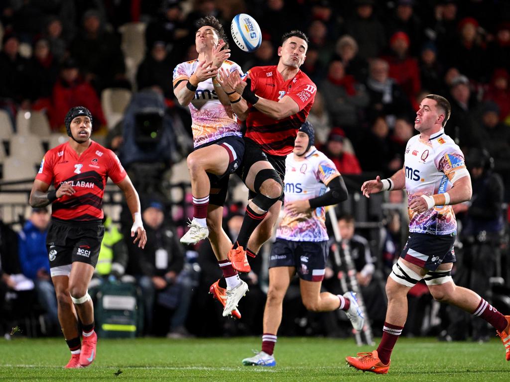 Queensland’s Jock Campbell competes with Crusaders’ Will Jordan for the ball. Picture: Getty Images