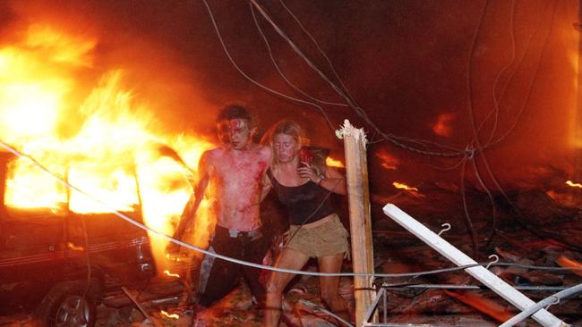 The picture of a barefoot Hannabeth Luke helping injured fellow Australian Tom Singer from the carnage of Bali’s Sari Club after a bomb ripped through the popular nightspot captured terrorism on Australia’s doorstep. The co-ordinated terror attacks on October 12, 2002 killed 202 people, including 88 Australians, and injured scores more.