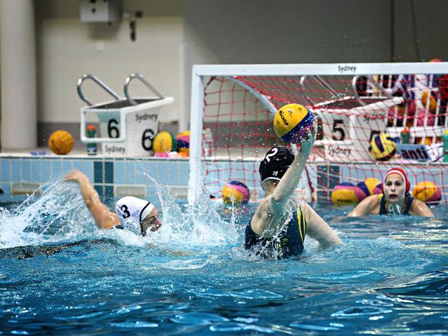 The Australian women's water polo team, the Stingers, are in their first Olympic training camp in Sydney. They will be doing pool training session so action pic required. Pic of captain Bronwen Knox. Photographer Adam Yip