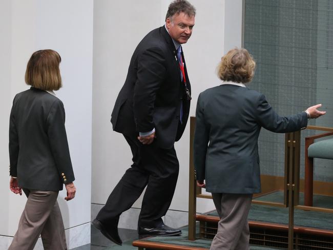 One Nation Senator Rod Culleton enters the Chamber and is escorted to visitors' seating on the floor during Question Time in the House of Representatives in Canberra today. Picture: Ray Strange.