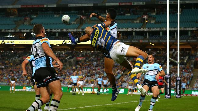 Blake Ferguson and Sosaia Feki get airborne at ANZ Stadium. (Photo by Matt Blyth/Getty Images)