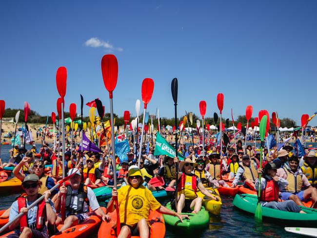 Sunday 26th, Port of Newcastle protest supplied by the group. Climate activists gathered at the Port of Newcastle have launched their kayak and catamaran flotilla for their second day blockading the waterways against coal - and cargo - ships. Day two of the 30-hour rally, allowed to proceed with police permission, will see a sandcastle-making competition on the shore and a "climate dogs parade" before the protesters are sent packing at 4pm.