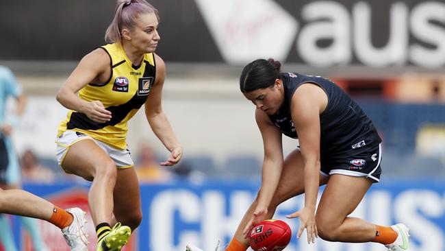 Carlton’s Madison Prespakis and Tiger Sarah Hosking during Saturday’s AFLW clash. Picture: Dylan Burns/AFL Photos