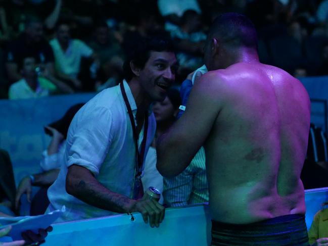 Justin Hodges talks to Johnathan Thurston at the Battle of the Reef fight night at the Townsville Entertainment and Convention centre, October 7 2023. Picture: Blair Jackson.