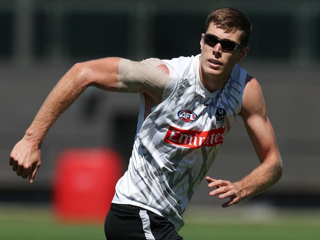 Mason Cox of the Magpies training in his prescription sunglasses. Picture: Michael Klein