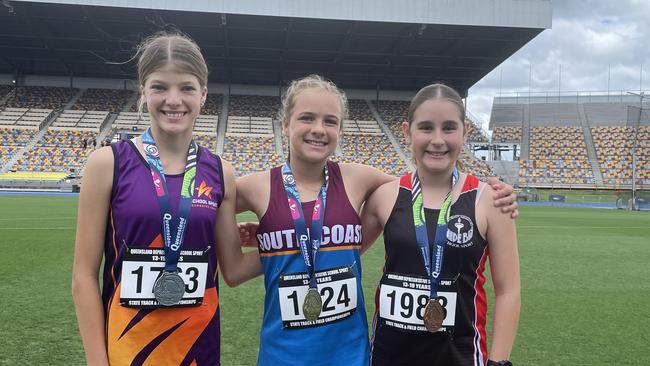 Jaida Burgoyne, middle, flanked by Jade McCoombes, right, and second placed Makayla Elcoate.