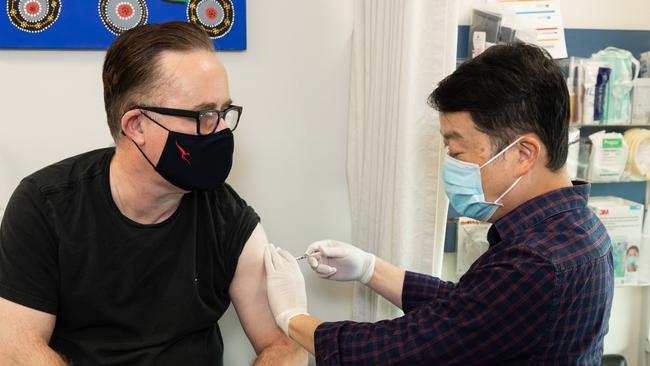 Qantas chief Alan Joyce receiving his Covid AstraZeneca vaccination.