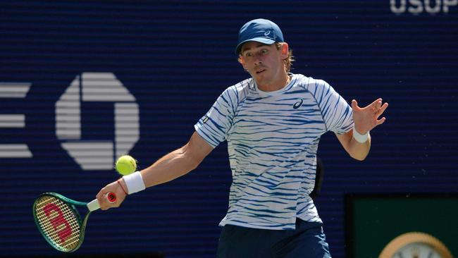 De Minaur was clearly struggling during the contest. (Photo by TIMOTHY A. CLARY / AFP)