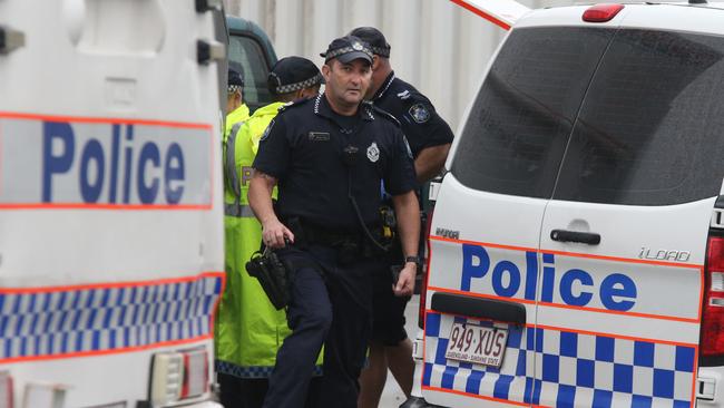 Police comb the scene outside Stocklands Shopping Centre Burleigh Heads where a body was found in a Charity Bin. Picture Glenn Hampson