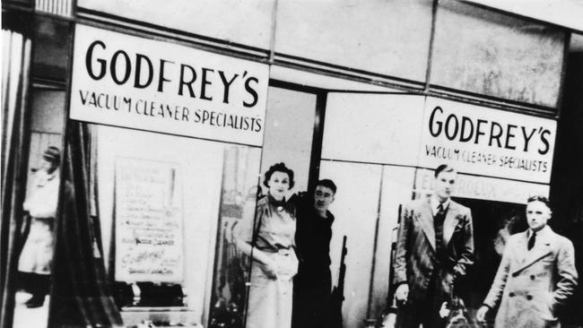 Former owner John Johnston outside Godfrey original Adelaide Arcade store. Picture: Supplied