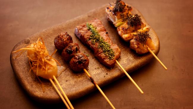 Yakitori: Scallop, wagyu meat balls, wagyu beef and chicken at Hideki. Picture: Steve Pohlner