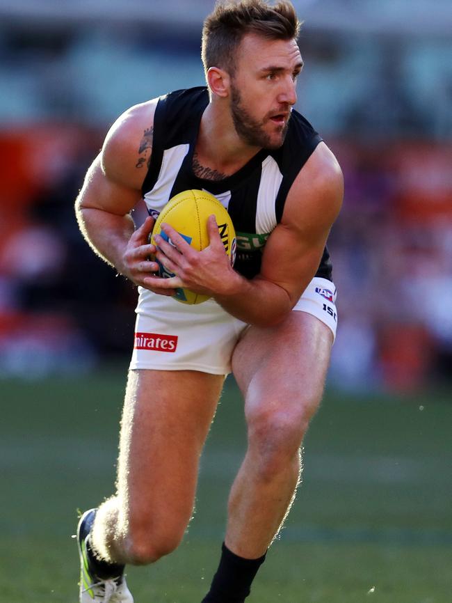 Lynden Dunn in action for the Pies. Picture: Michael Klein