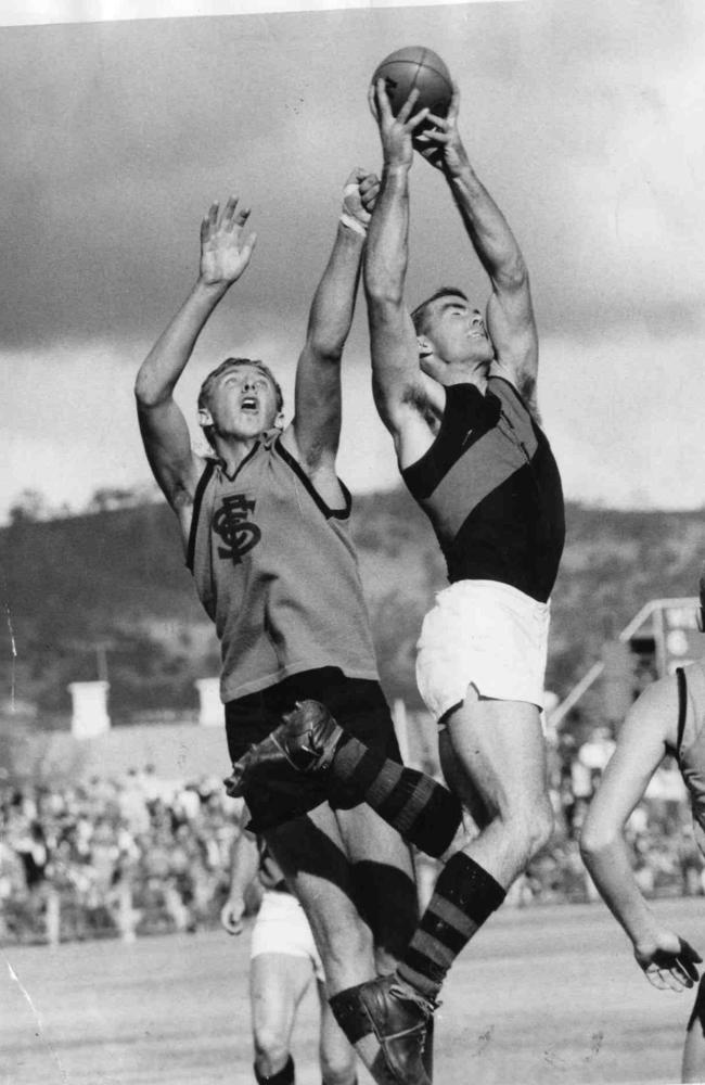 Neil Kerley flies for a mark against Sturt at Unley Oval.