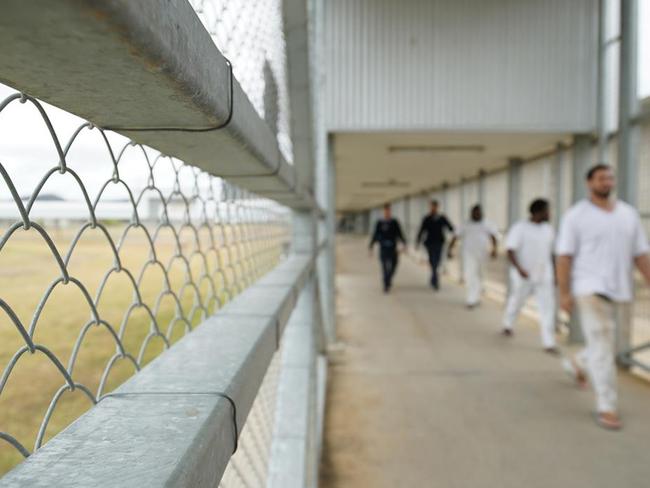 Staff escort prisoners through Queensland; Lotus Glen Correctional Centre. The male prison with a capacity to detain roughly 730 prisoners, over half of whom are Aboriginal and Torres Strait Islander prisoners. Picture: Daniel Soekov for Human Rights Watch