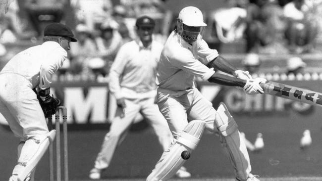 Pakistan cricket star turned Prime Minister Imran Khan slashes away against Australia at Adelaide Oval in 1990. 