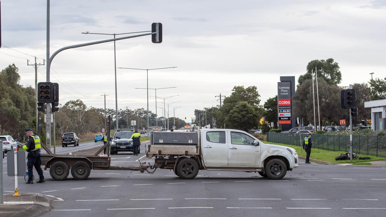 Police at the scene at the intersection of Melaluka Road and Bellarine Highway, Leopold. Picture: Brad Fleet