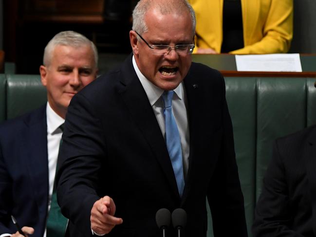 Deputy Prime Minister Michael McCormack (left) Prime Minister Scott Morrison and Minister for Defence Christopher PyneÊduring Question Time in the House of Representatives, at Parliament House, Canberra, Tuesday, 2 April 2019. (AAP Image/Sam Mooy) NO ARCHIVING