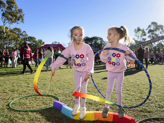 Lexi (left) and Madison Wilkinson at Sadie's Day Out, a special community event to celebrate the life of five-year-old crash victim Sadie, held at Cambooya State School, Saturday, June 7, 2025. Picture: Kevin Farmer