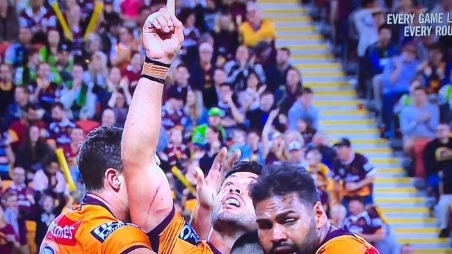 Broncos star Alex Glenn scores against the Raiders on Saturday night — he raised his finger to point to the sky in tribute to Burleigh man Nathan Vogel who died earlier this week after falling of his bike when it hit a retaining wall. Mr Glenn is the partner of the best friend of Mr Vogel's sister Sigrid