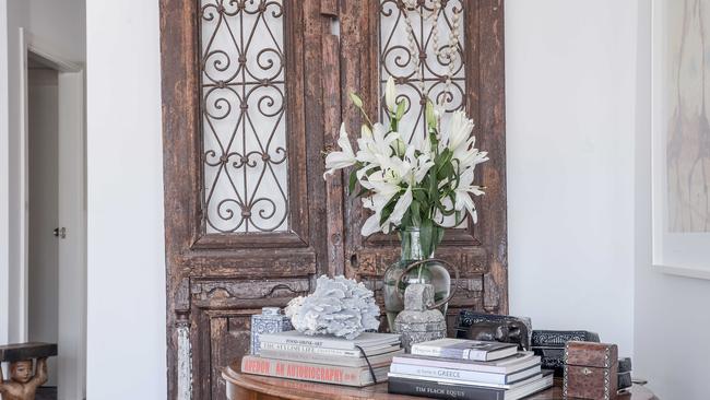 An antique door functions as wall decoration. Picture: Flavio Brancaleone