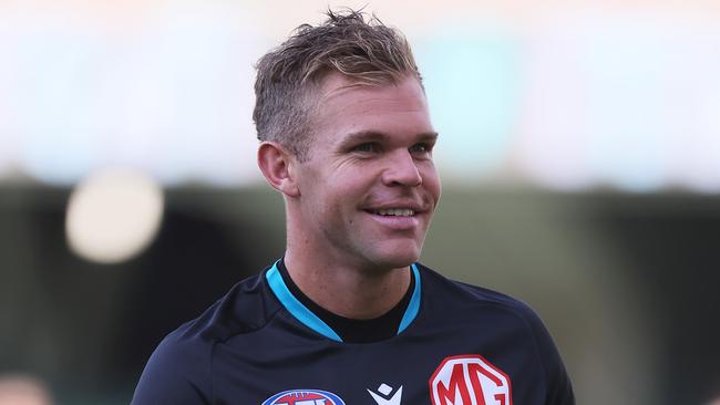 ADELAIDE, AUSTRALIA – MARCH 30: Dan Houston of the Power warms up during the 2024 AFL Round 03 match between the Port Adelaide Power and the Melbourne Demons at Adelaide Oval on March 30, 2024 in Adelaide, Australia. (Photo by James Elsby/AFL Photos via Getty Images)