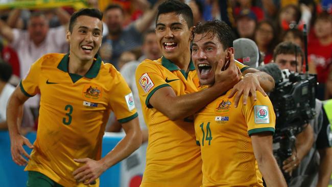 SYDNEY, AUSTRALIA - JANUARY 31: James Troisi of Australia celebrates with his team mates after scoring a goal during the 2015 Asian Cup final match between Korea Republic and the Australian Socceroos at ANZ Stadium on January 31, 2015 in Sydney, Australia. (Photo by Mark Kolbe/Getty Images)