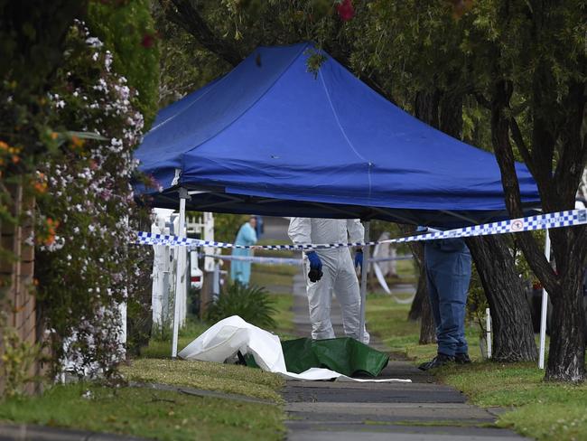 Forensic officers at the scene.