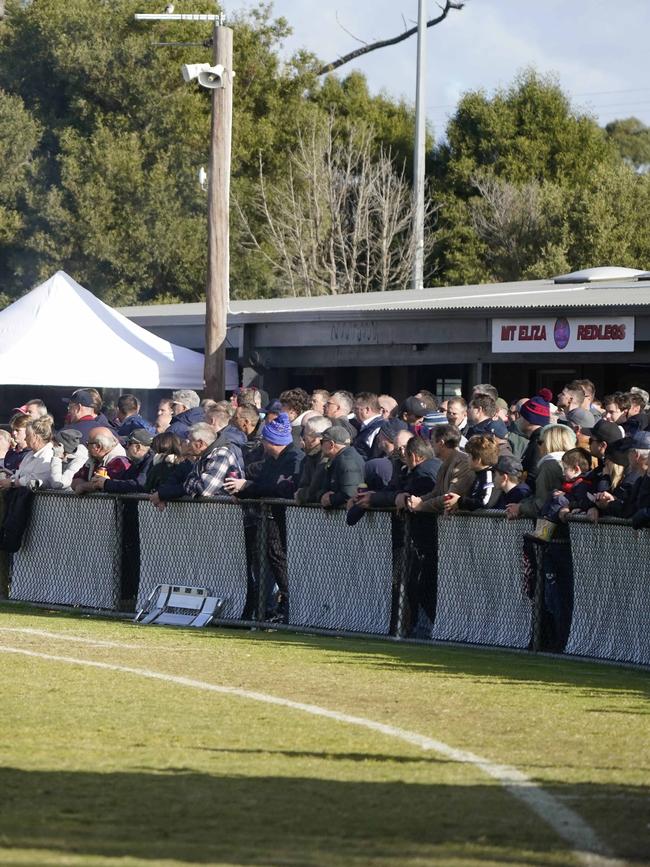 A big crowd watches on. Pictures: Valeriu Campan