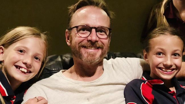 Damien Allport with his daughters. Picture: supplied