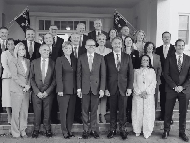 Prime Minister Anthony Albanese poses with his new Ministry after a swearing-in ceremony at Government House in June 2022.