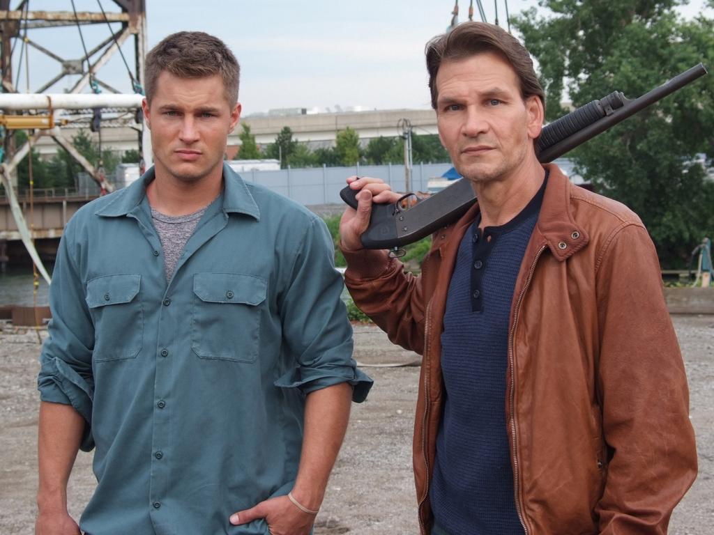 Travis appeared alongside Patrick Swayze in the US television show “The Beast” in 2009. Picture: Supplied