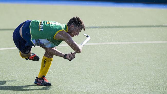 Joel Rintala strikes for Brisbane. Picture: Kevin Farmer