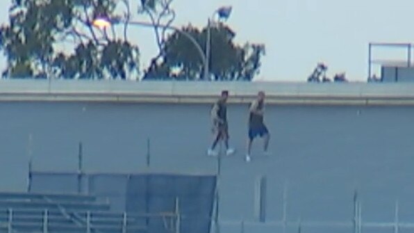 Inmates on the roof of the Capricornia Correctional Centre during the 2021 riots. Picture: 7 News