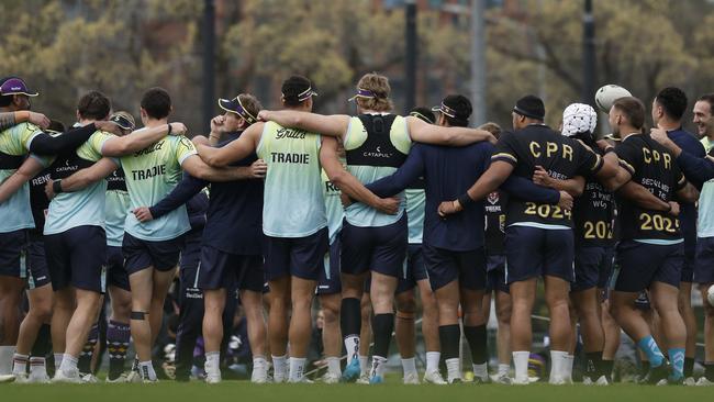 MELBOURNE, AUSTRALIA - SEPTEMBER 22: Storm players huddle during a Melbourne Storm NRL training session at Gosch's Paddock on September 22, 2024 in Melbourne, Australia. (Photo by Daniel Pockett/Getty Images)