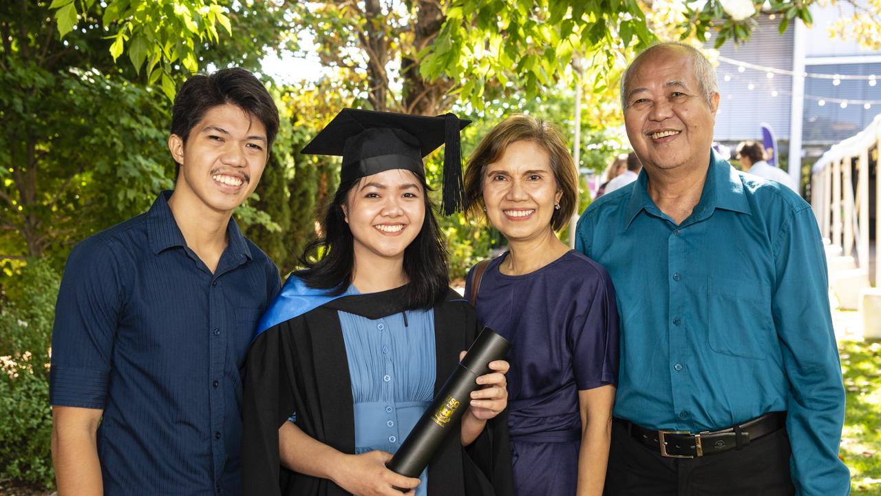 Bachelor of Nursing graduate Caryl Suyom with brother Sean Suyom and parents Rosario and Reynaldo Suyom at the UniSQ graduation ceremony at Empire Theatres, Wednesday, December 14, 2022.