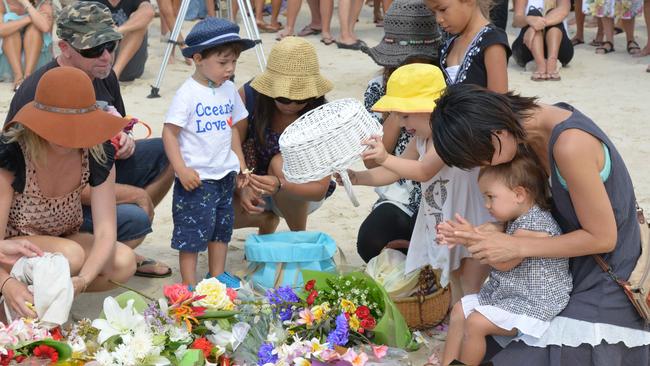 People gather at Shelly Beach, Ballina to pay their respects for deceased Japanese surfer Tadashi Nakahara who tragically died following a shark attack Photographer — Brian Pamphilon